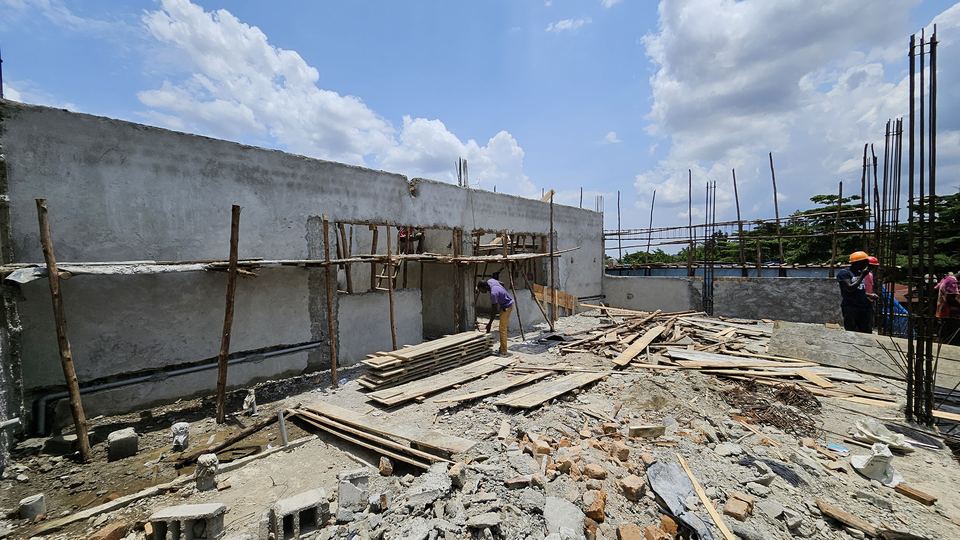 Concrete walls and scaffolding on a building under construction