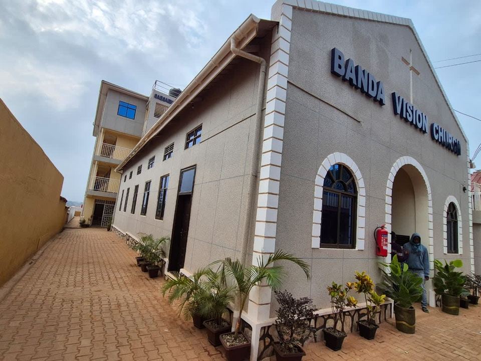 Exterior of Banda Vision Church with its name on the front wall